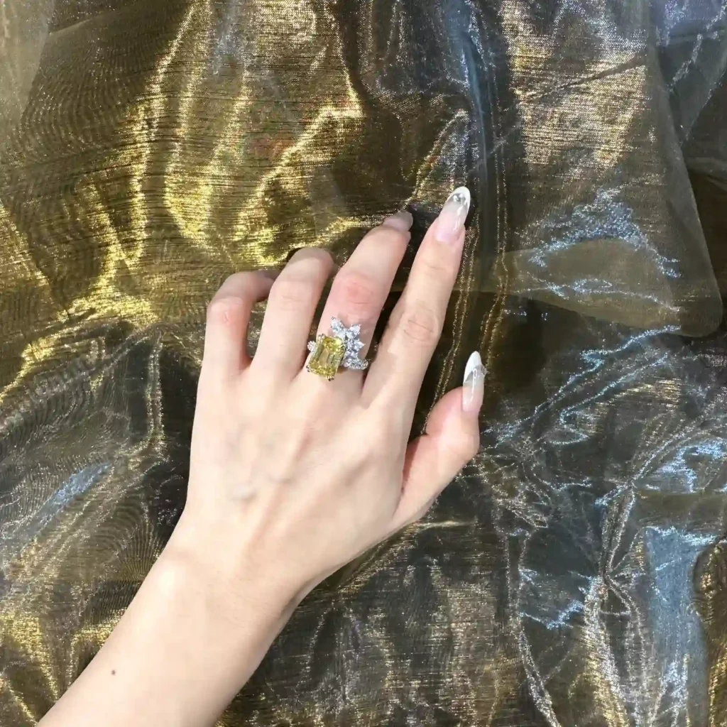 Flower cluster radiant-cut yellow diamond ring