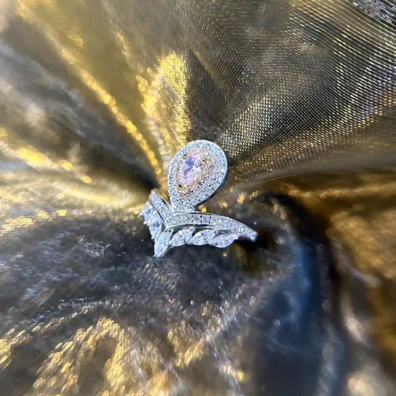 Crown Pink Diamond Ring with Marquise Side Diamonds
