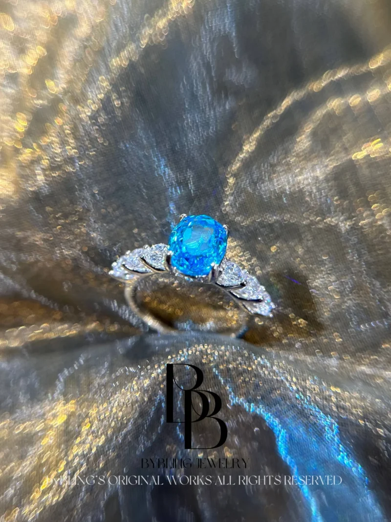 The oval-shaped aquamarine and diamond ring
