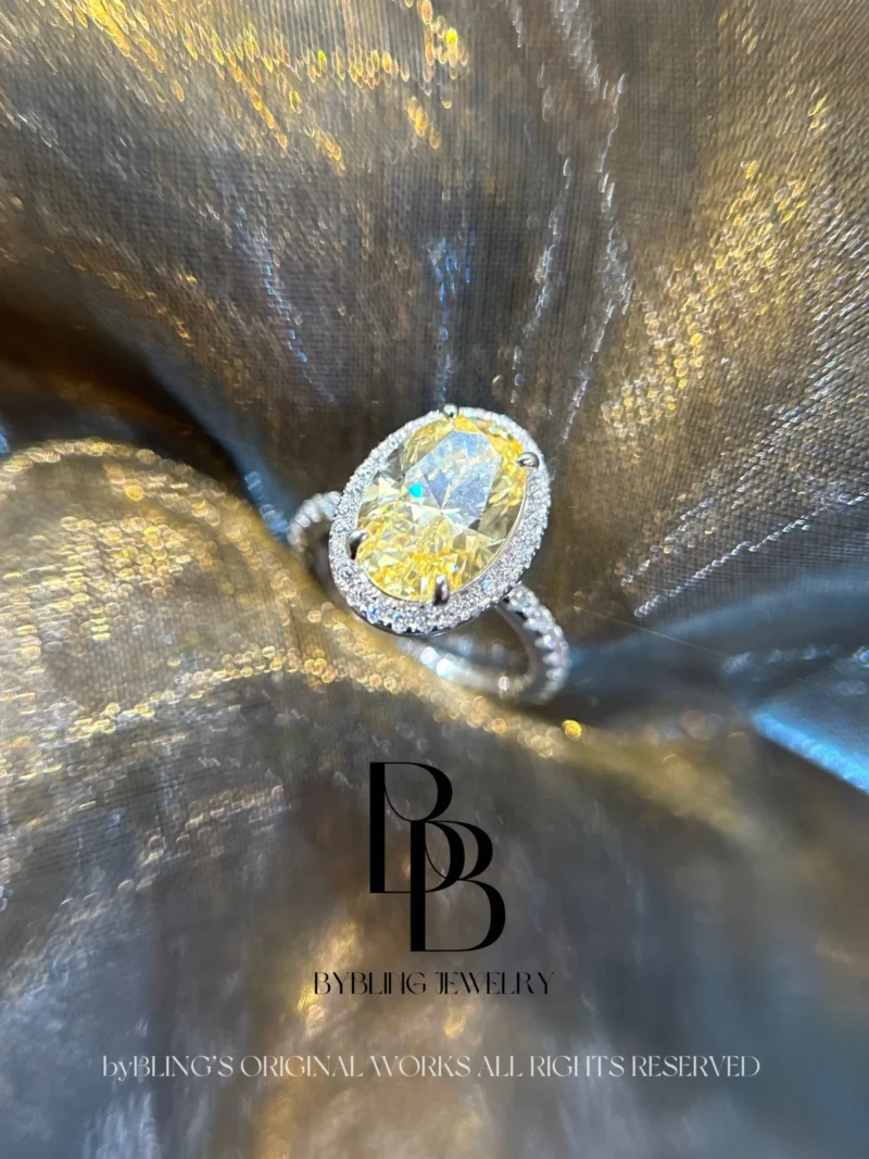 The oval-shaped yellow diamond and diamond ring