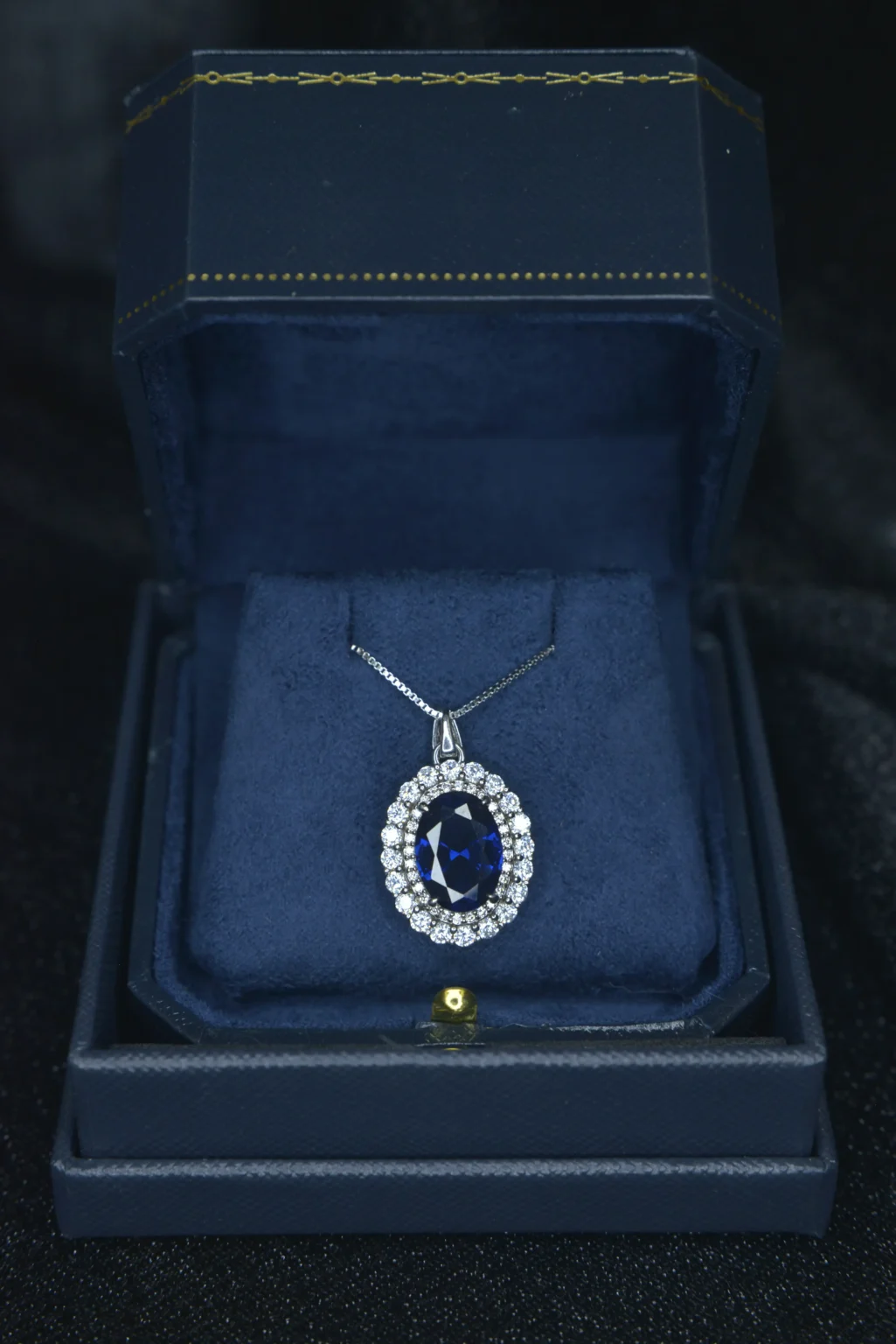 Classic Oval-shaped Blue Sapphire and Diamonds Halo Pendant - Image 6