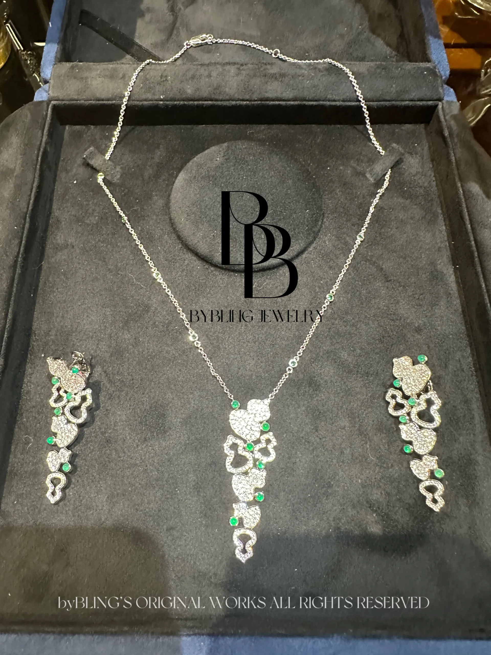 Hulu Emerald & Diamond Earrings