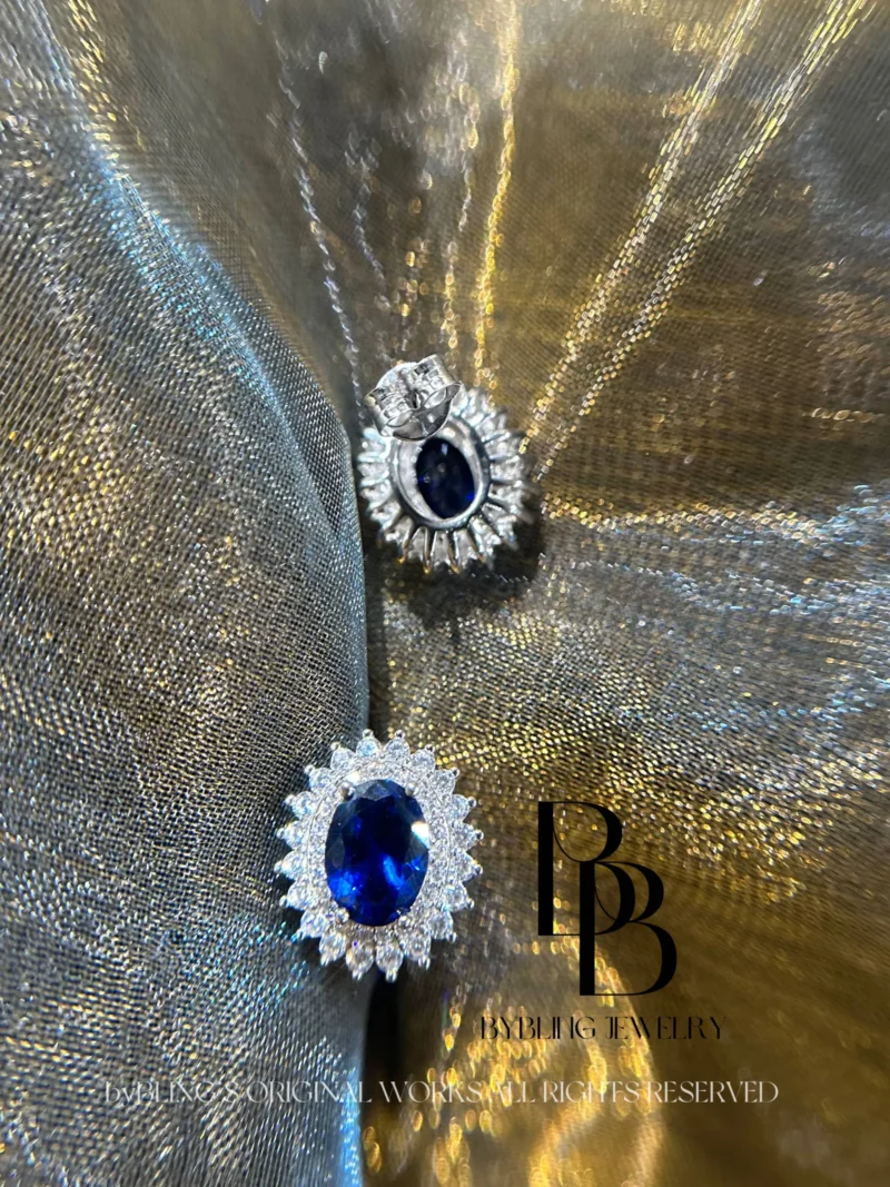 Classic oval-shaped sapphire and diamond earrings