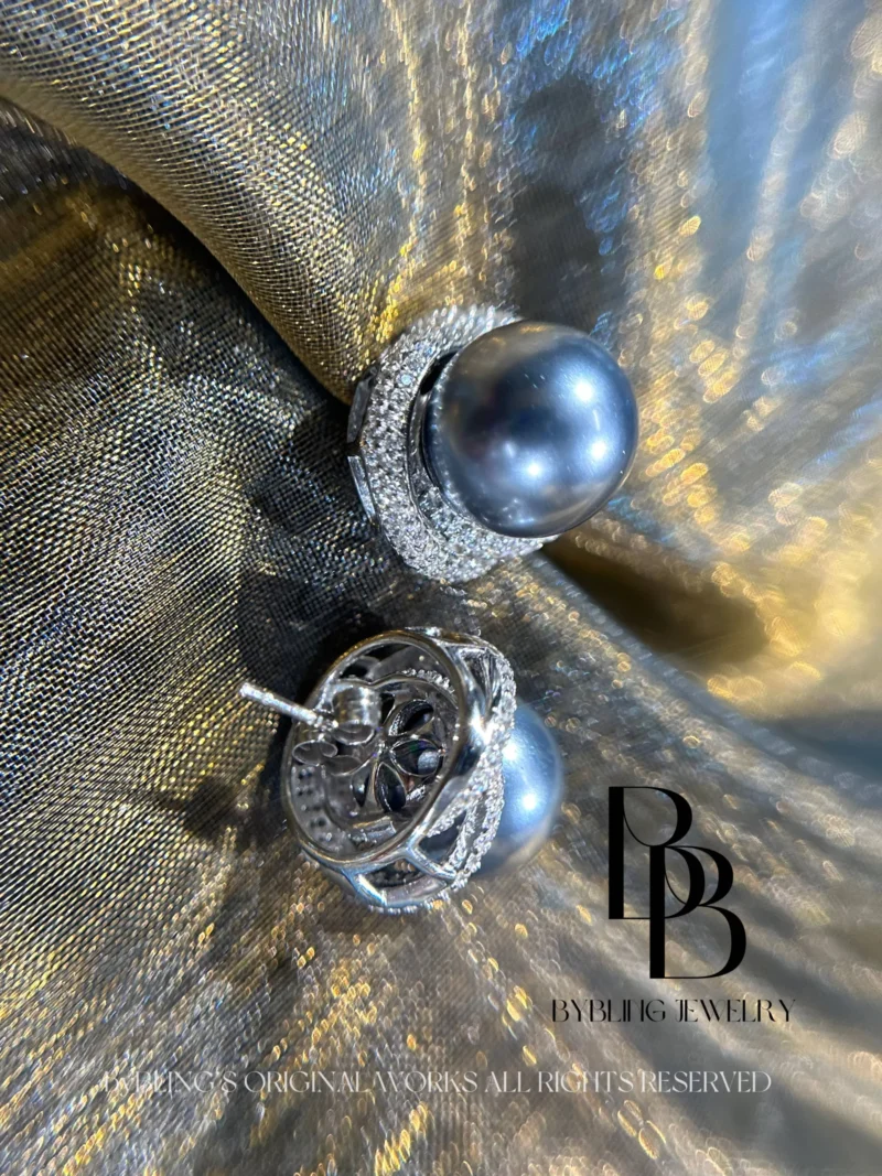 The Tahitian pearl and diamond earrings
