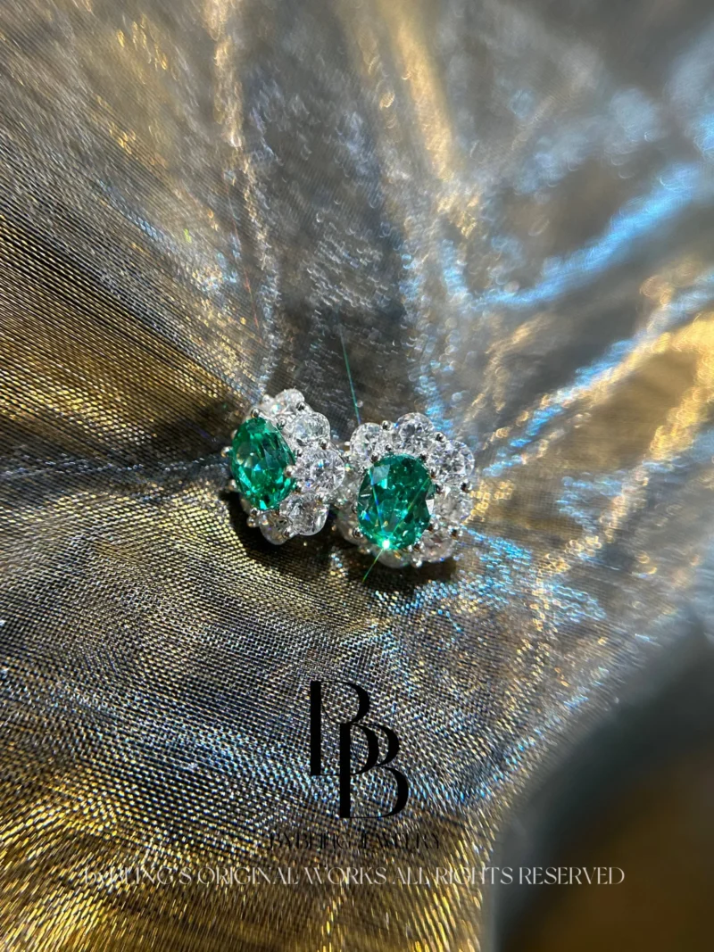 Oval-Shaped Paraiba and Diamond Earrings